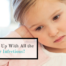 child holding ear words whats up with ear infections